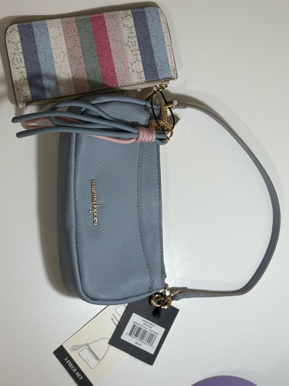 Salvatore Ferragamo Powder Blue Pebbled Leather Mini Wristlet with Pink Tassel